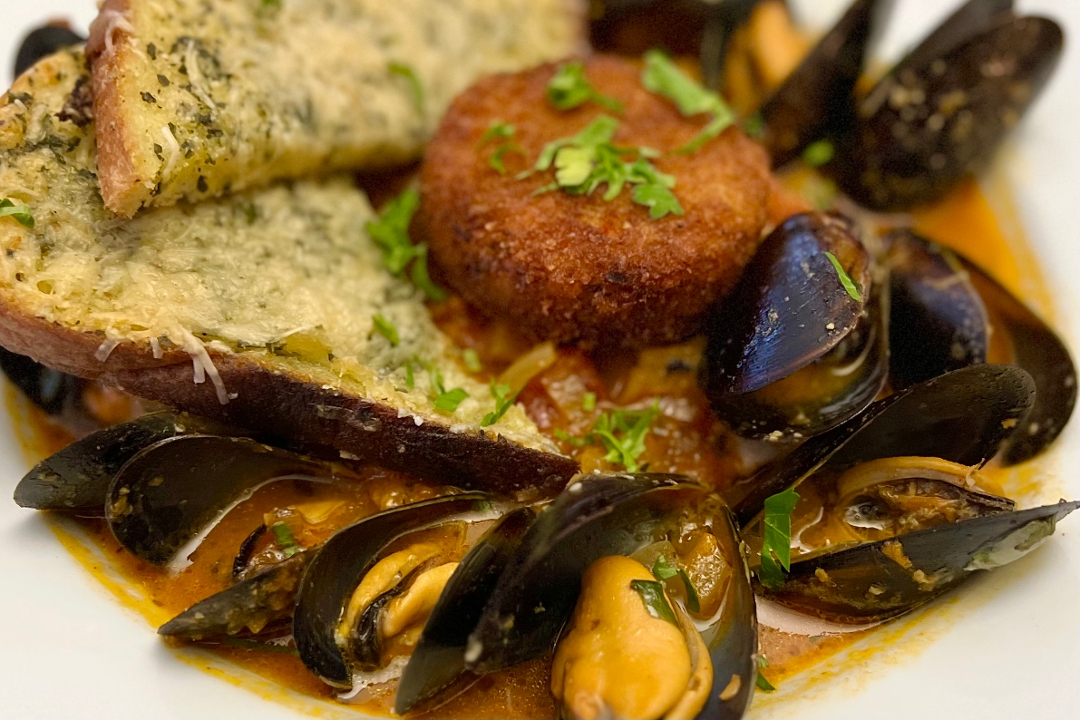 Order Pacific NW Seafood Cioppino food online from Seasons & Regions Seafood Grill store, Portland on bringmethat.com