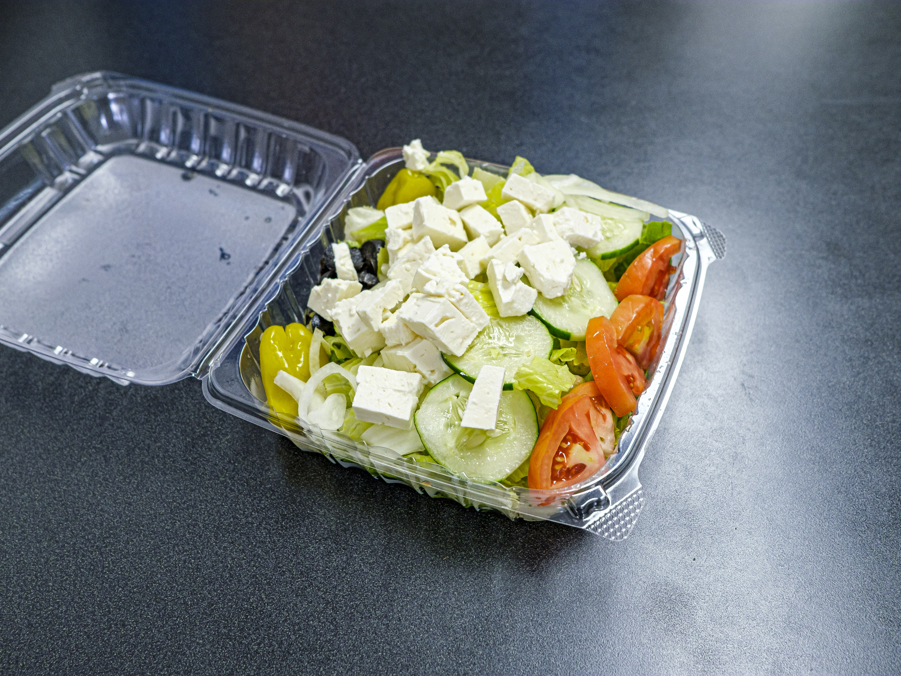 Order Greek Salad food online from Aladdin's Kitchen store, Washington on bringmethat.com