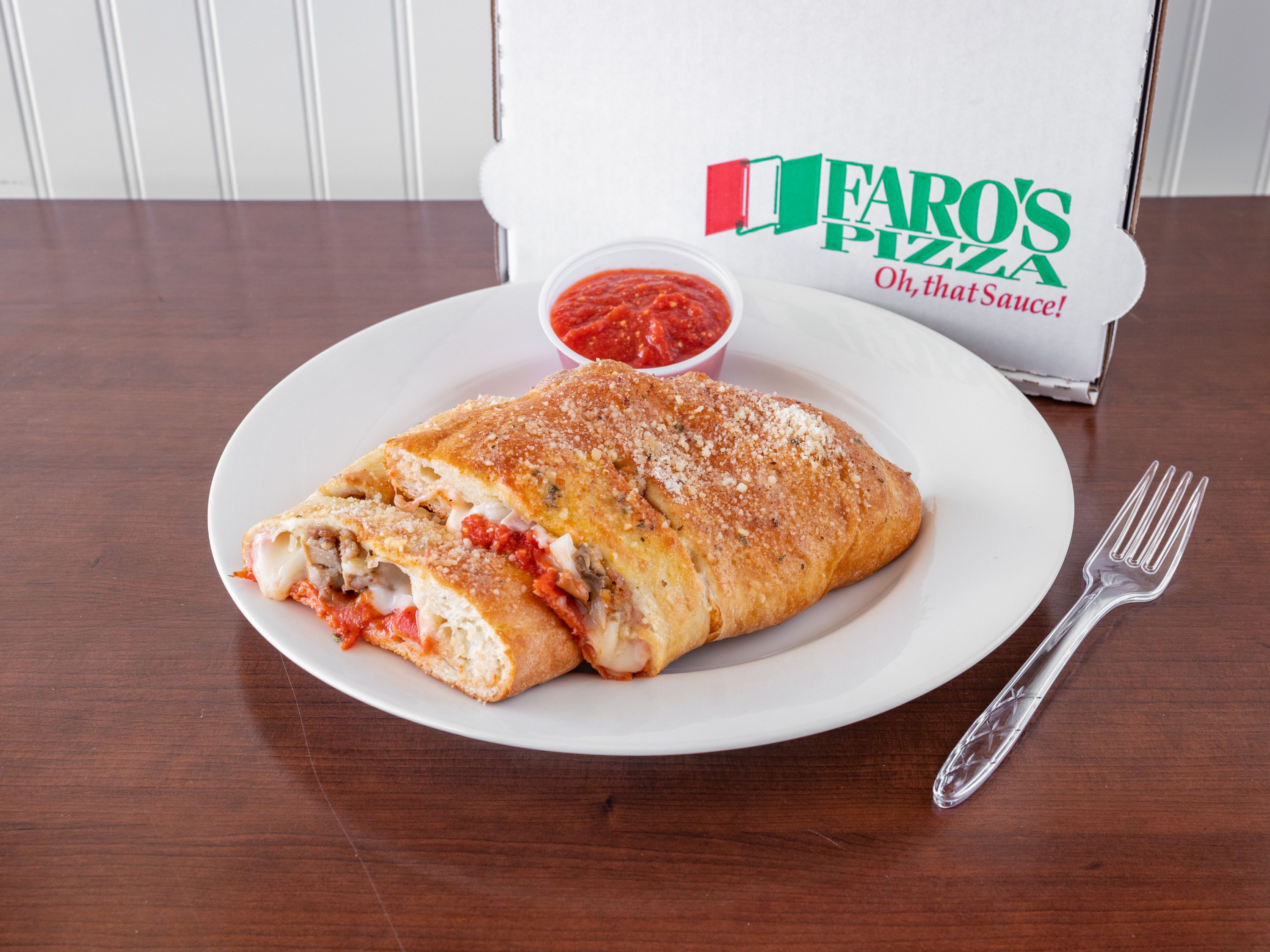 Order Make Your Own Stromboli food online from Faro's Italian Pizza store, Grand Rapids on bringmethat.com