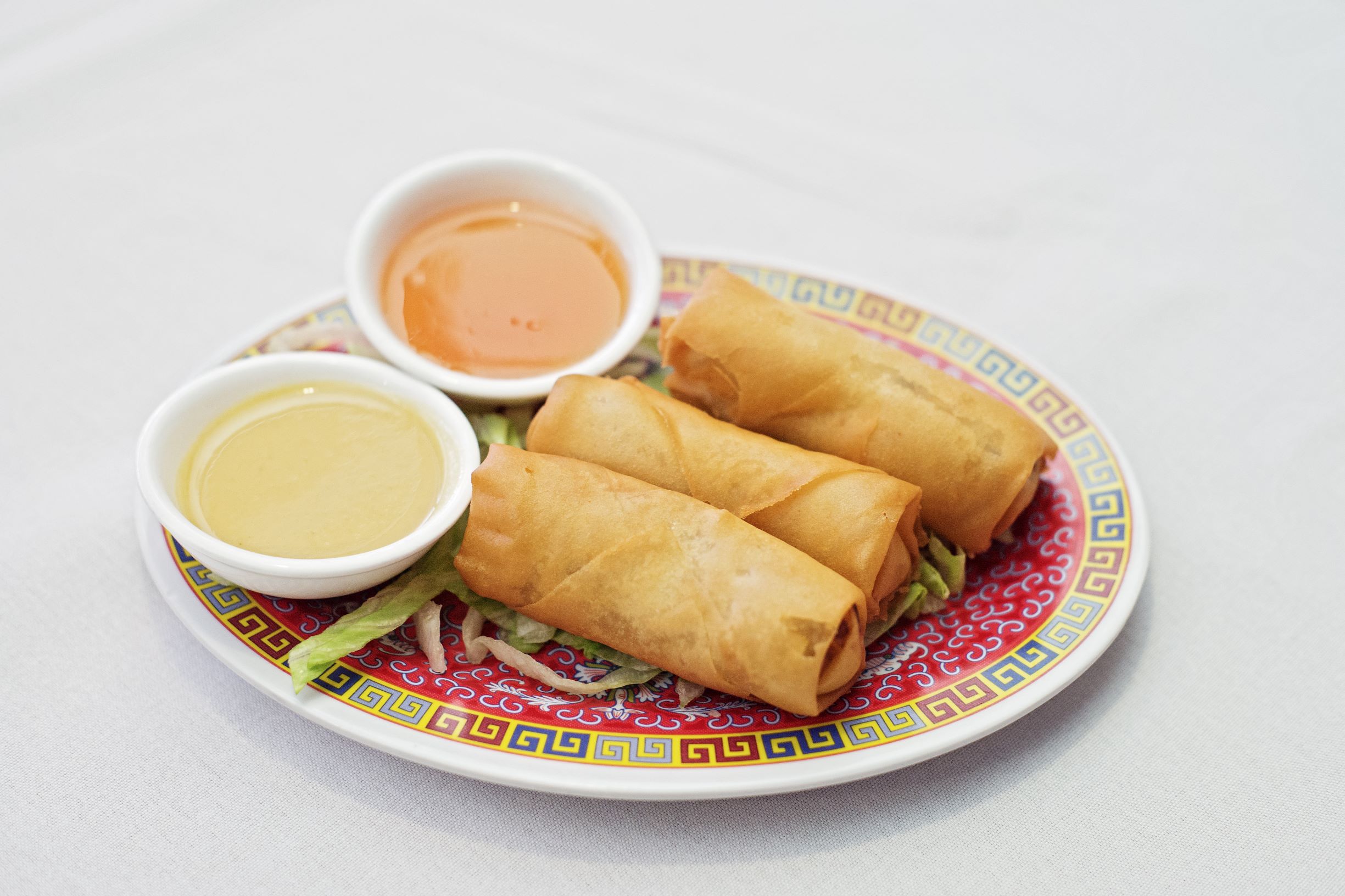 Order Fried Veggie Spring Roll (4) food online from Red Ginger China Bistro store, Saint Paul on bringmethat.com