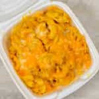 Order Macaroni & Cheese food online from Caribbean Hut store, Charlotte on bringmethat.com