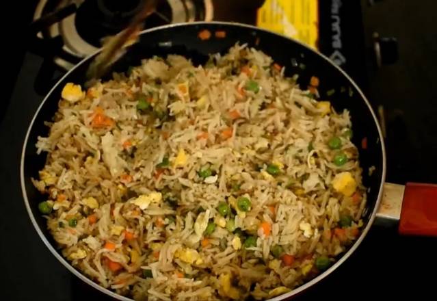 Order Spicy Egg Fried Rice food online from Desi Chops store, Brentwood on bringmethat.com