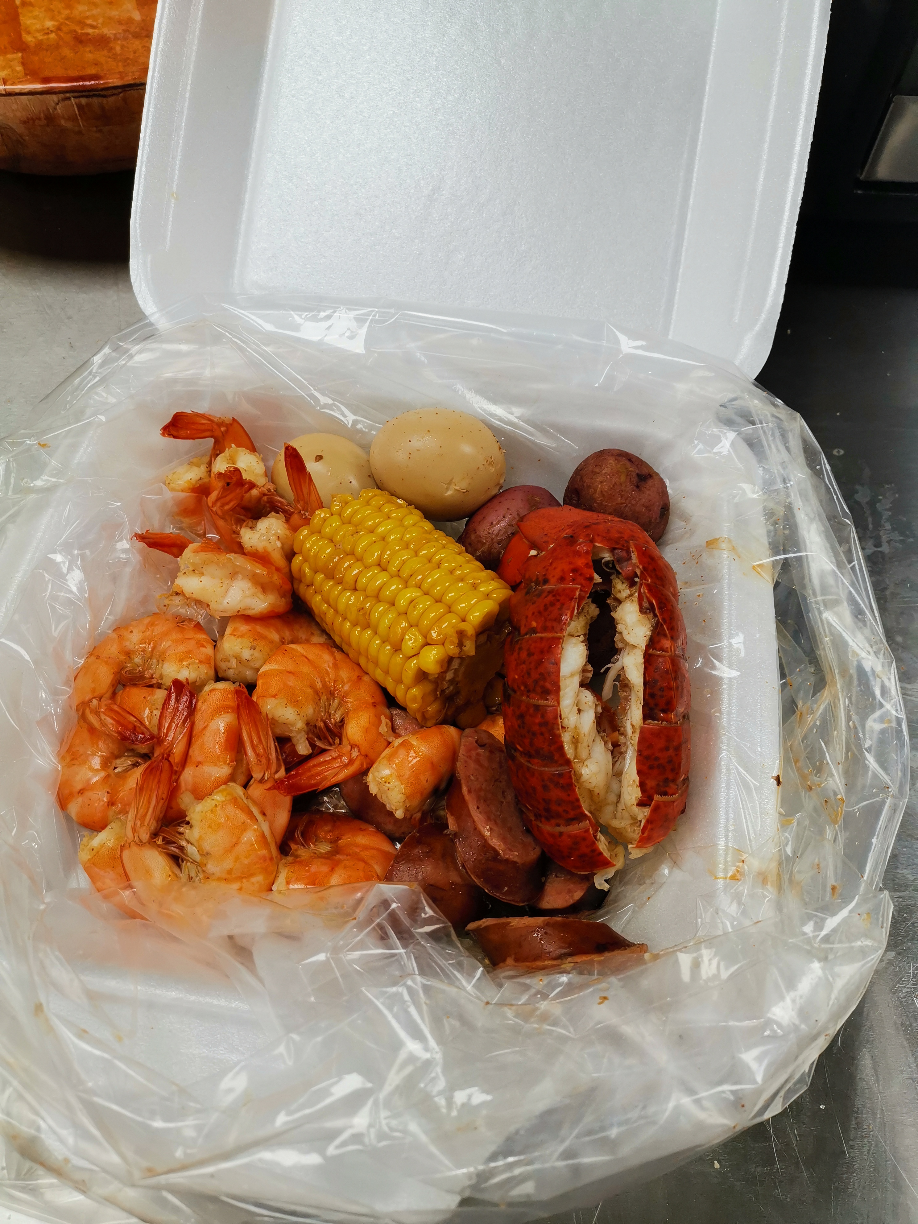 Order Any 2  Seafood Combo food online from Cajun Seafood & Grill store, Greensboro on bringmethat.com