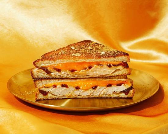 Order ‘Murrican Made Chick Grilled Cheese food online from Jinky Cafe store, Sherman Oaks on bringmethat.com