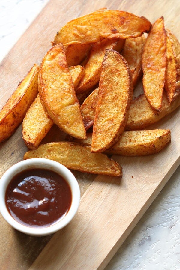 Order Potato Wedges - Side food online from Yaya Pizza store, Upland on bringmethat.com