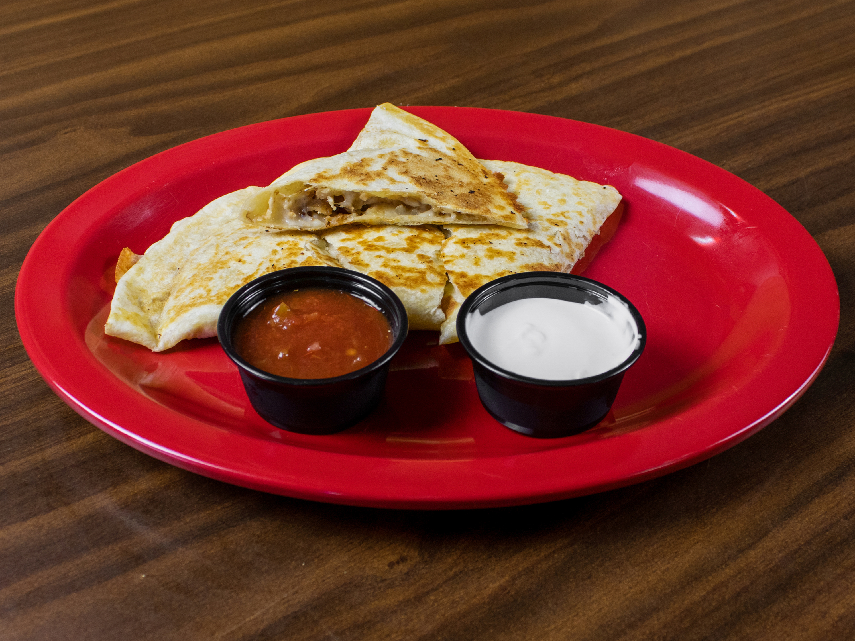 Order Chicken Quesadilla food online from Dawg House Bar & Grill store, Macon on bringmethat.com