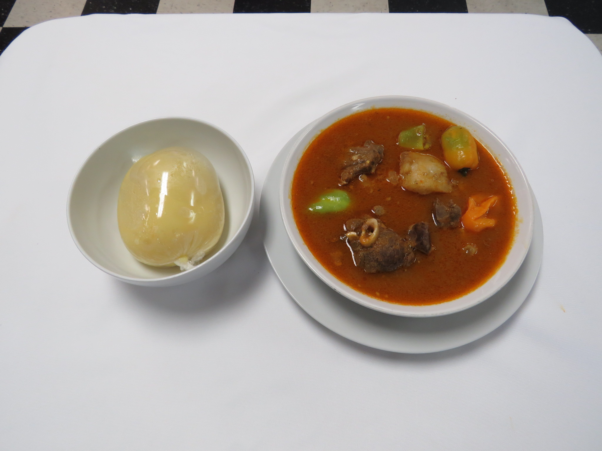 Order Goat Light Soup food online from Gold Coast Catering store, Worcester on bringmethat.com