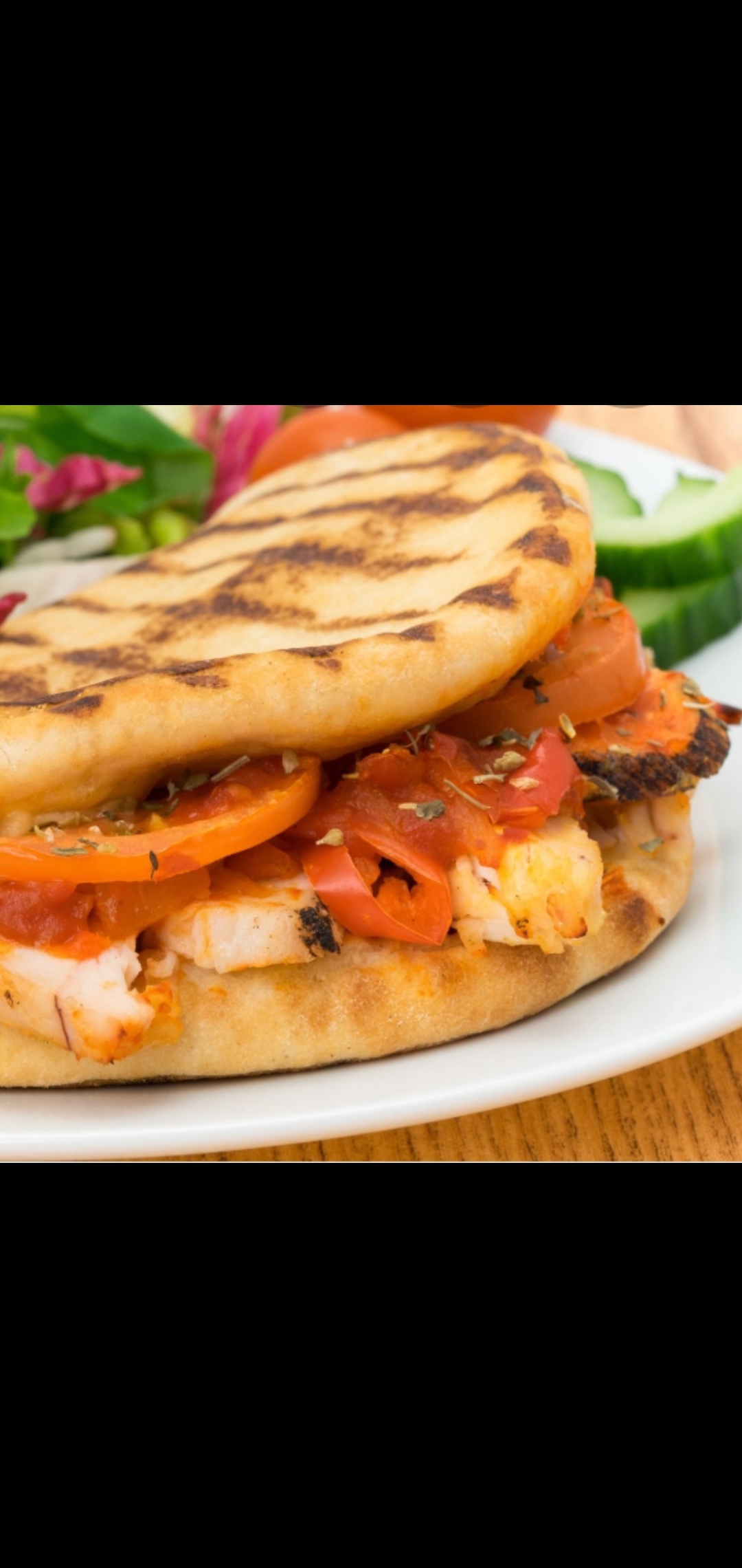 Order Buffalo Chicken Melted Cheese Panini (chicken cutlet cheese lettuce tomatoes) food online from American Gourmet Foods Deli store, New York on bringmethat.com