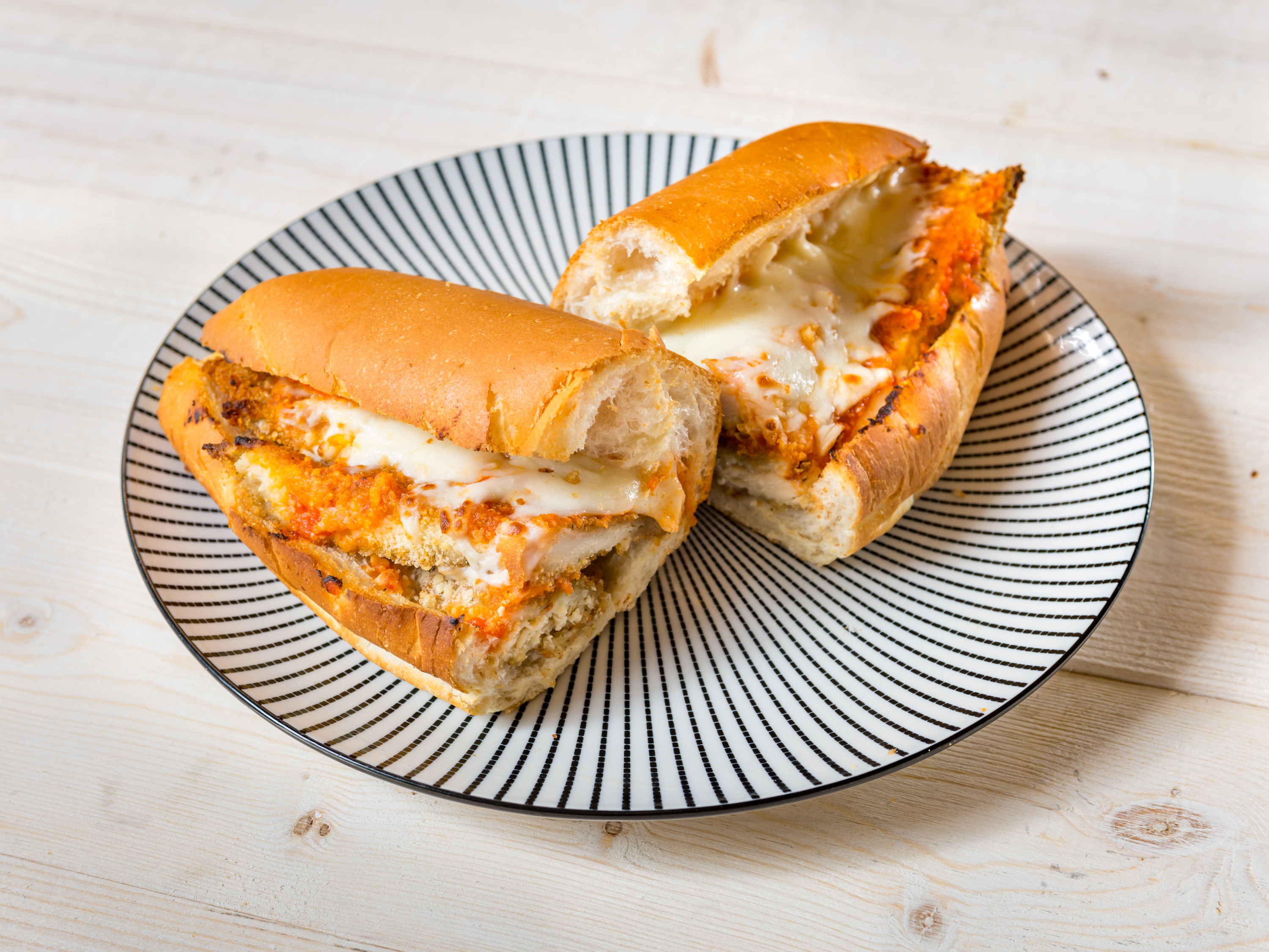 Order Chicken Parmesan on a 10" roll food online from Mike Famous Steaks & Subs store, Newark on bringmethat.com