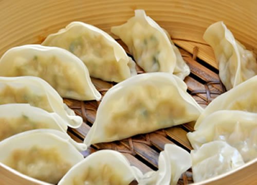 Order 10. Chicken Dumplings(8) food online from Chen's Yummy House store, Dumont on bringmethat.com
