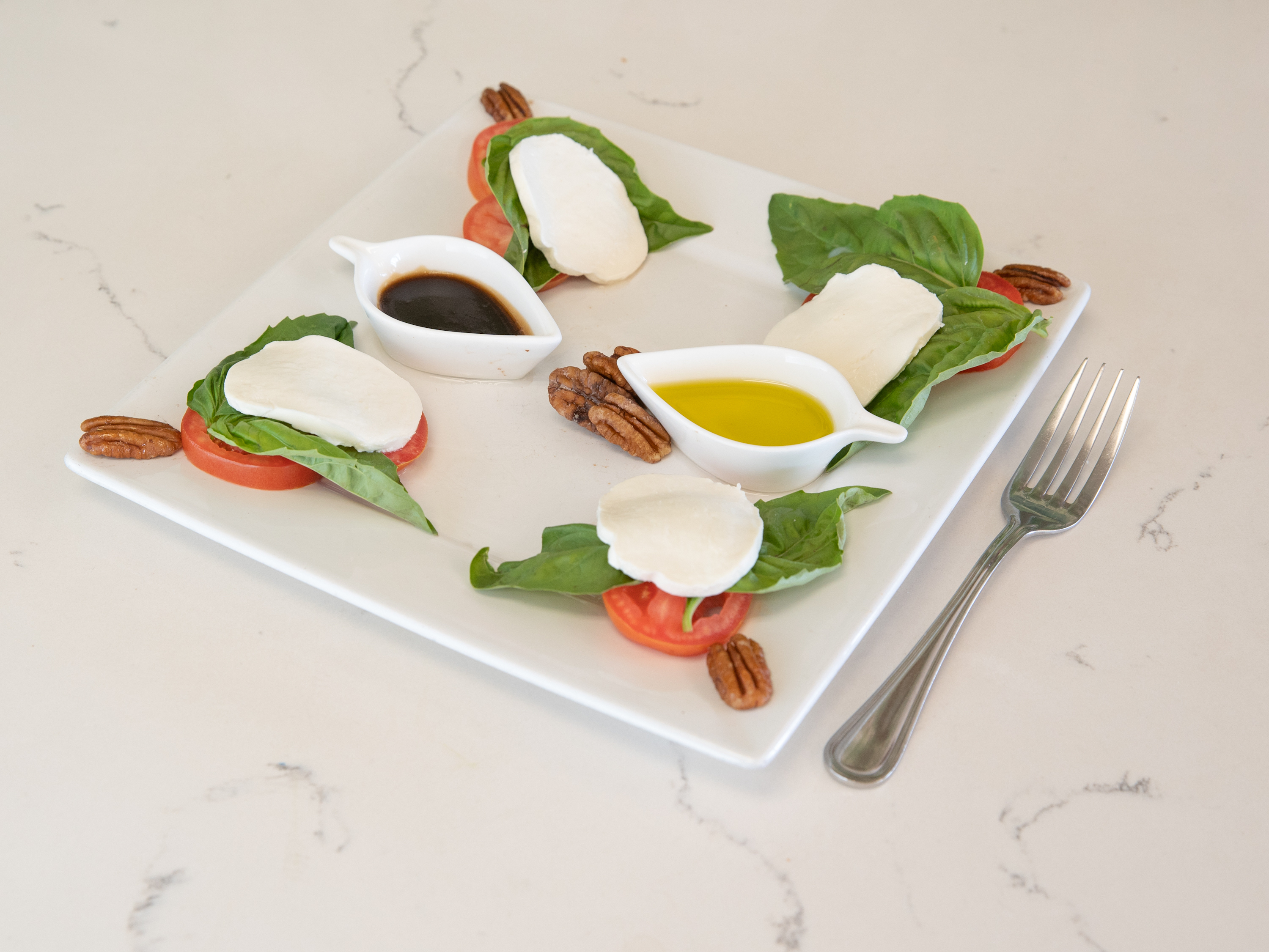Order Caprese Salad food online from Classics Flowers Cafe Bakery store, Cypress on bringmethat.com