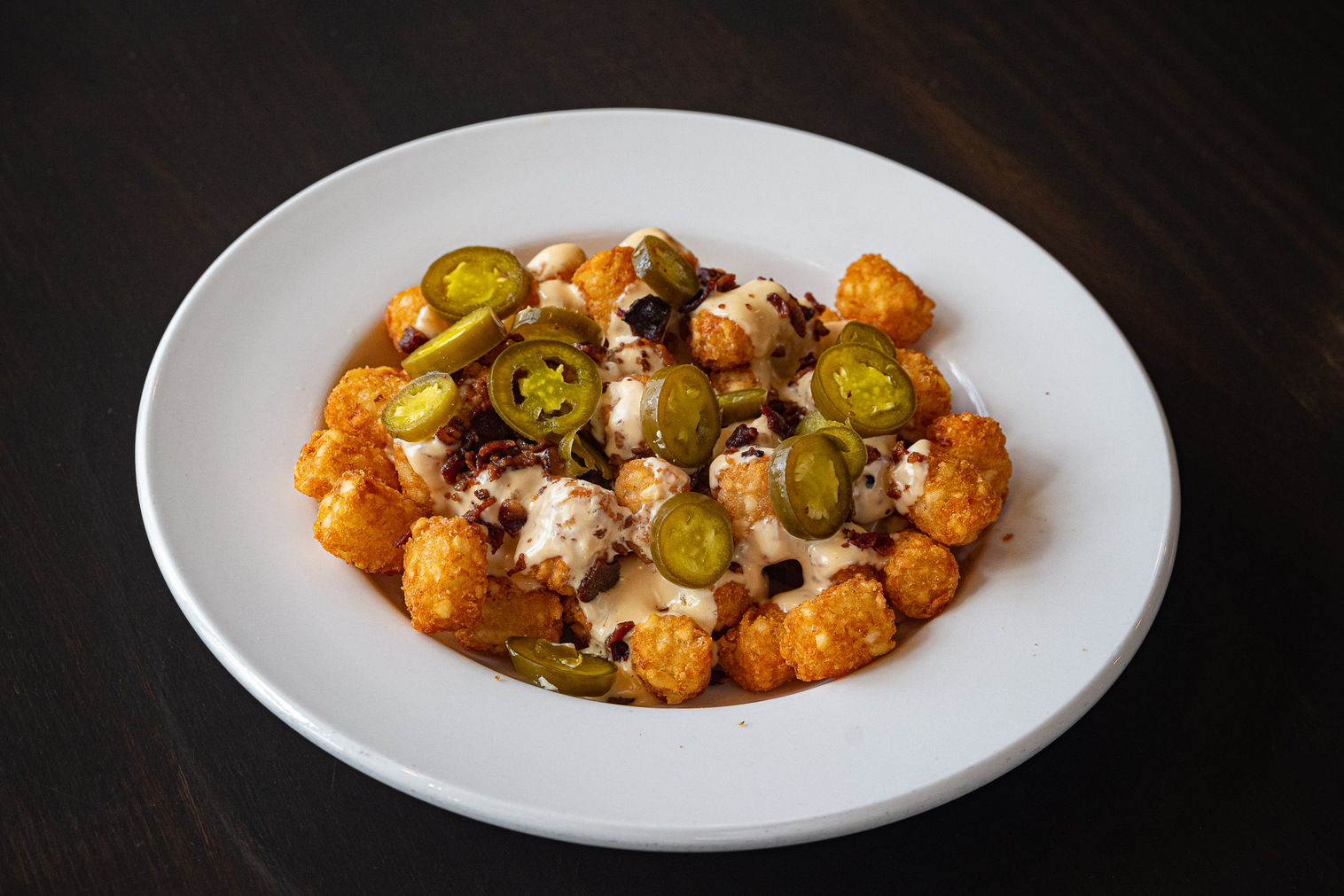 Order Loaded Tots food online from 15th Street Tavern store, Clarkston on bringmethat.com