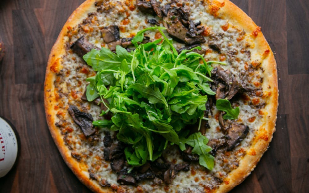 Order Truffle Mushroom Pizza - Medium 12" food online from New York Pizzeria store, Houston on bringmethat.com