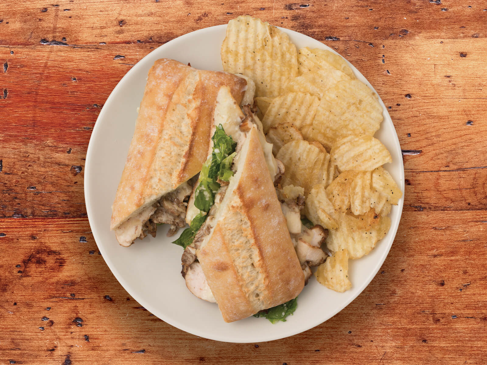 Order Chicken Caesar food online from La Madeleine French Bakery & Cafe store, Dallas on bringmethat.com