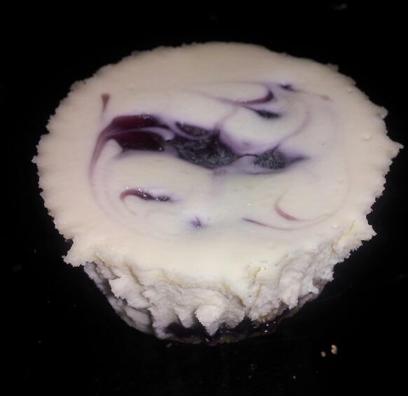 Order Blueberry Haze N Glaze Cheesecake food online from Happybottoms Cheesecakes store, Mechanicsville on bringmethat.com