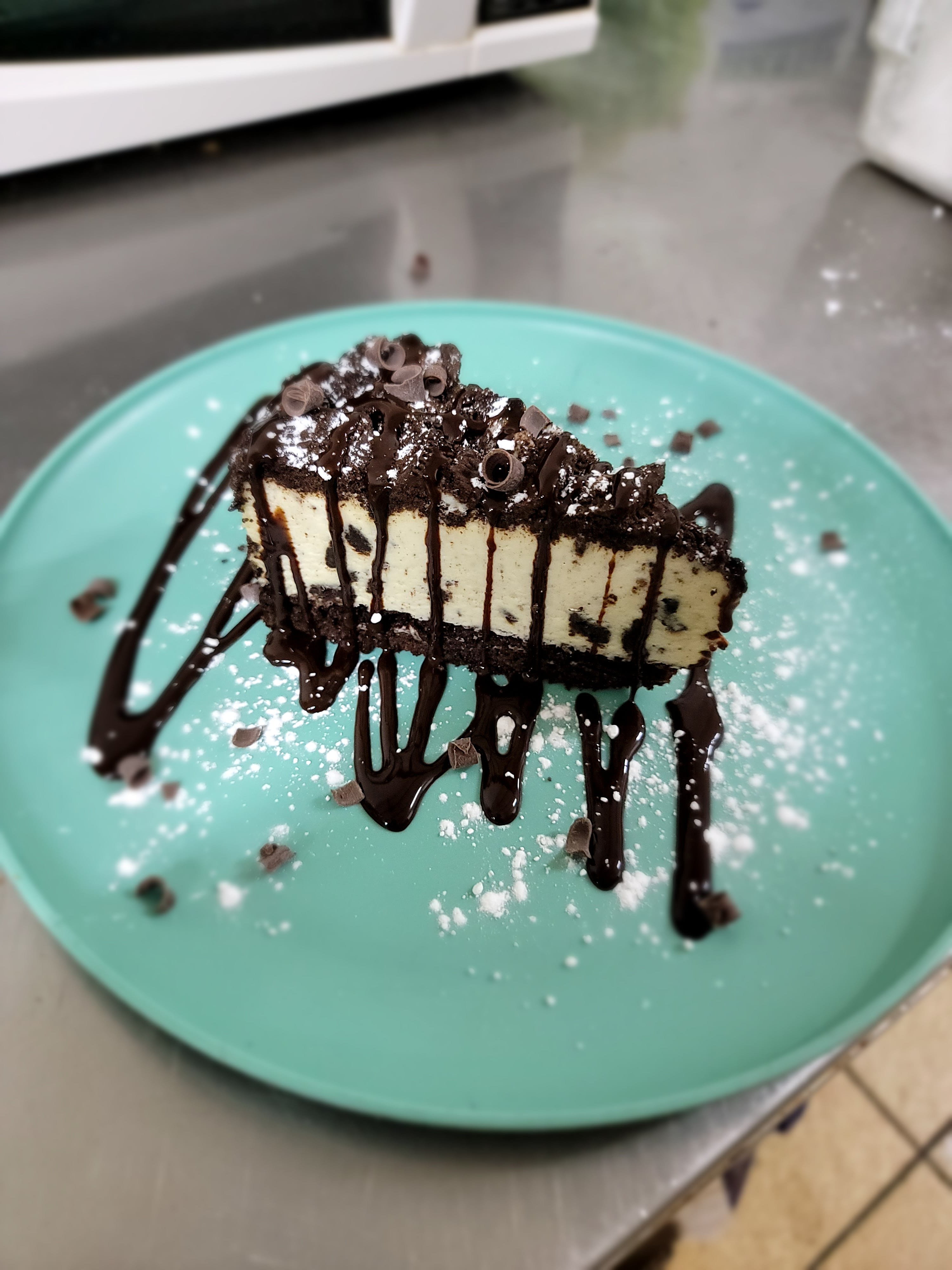 Order Oreo Mousse Cake - Dessert food online from Tony Pizza store, Highspire on bringmethat.com