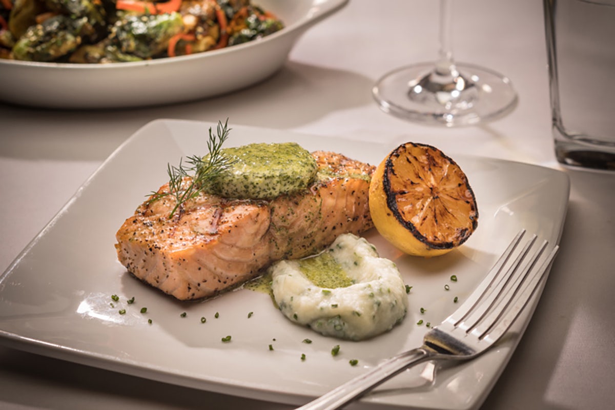 Order Chargrilled Salmon* | GF food online from Perry's Steakhouse & Grille store, Raleigh on bringmethat.com
