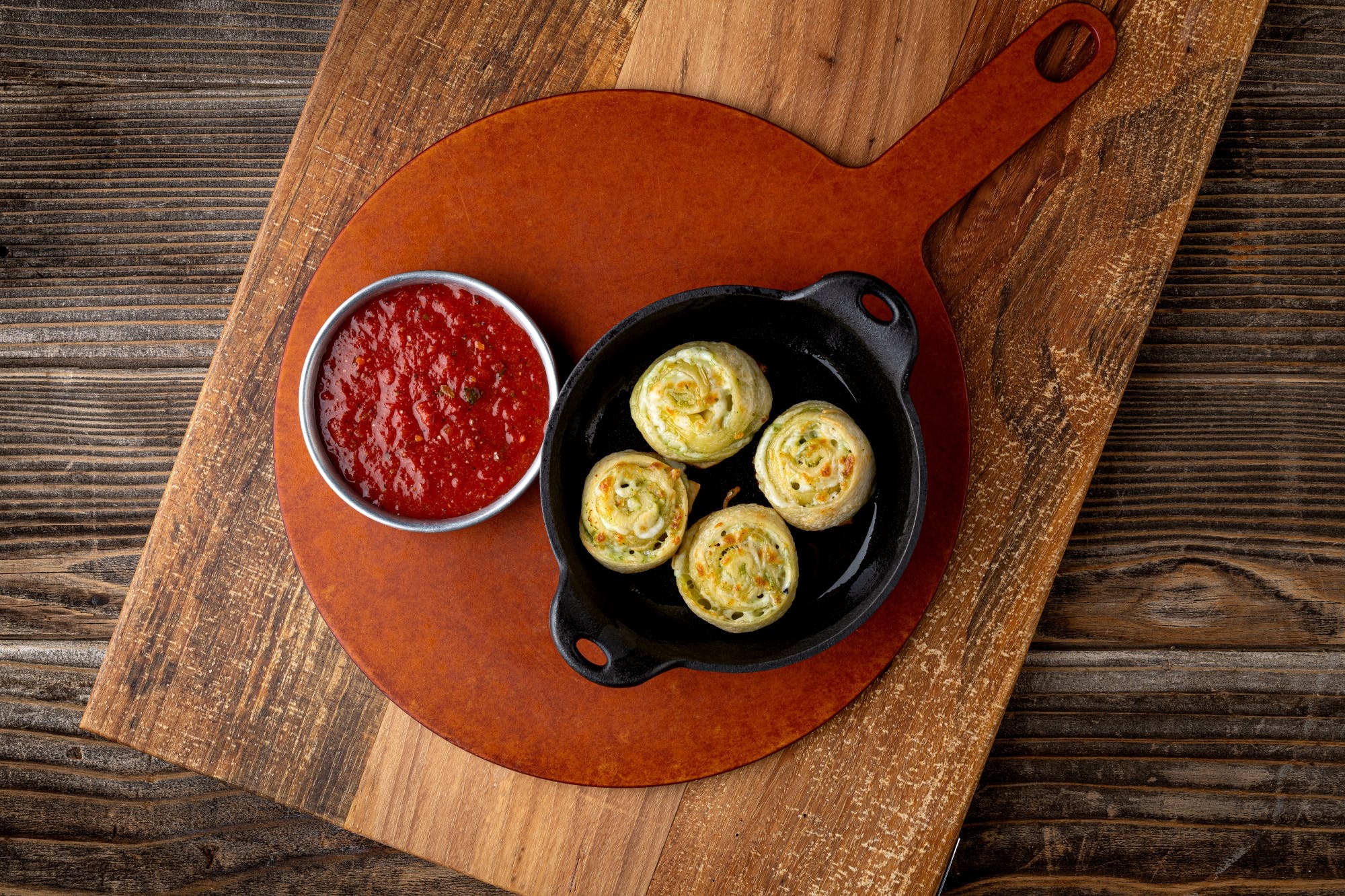 Order Garlic Pesto Rotoli - 2 Pieces food online from Fired Pie store, Glendale on bringmethat.com