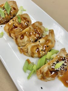 Order Pan Fried Dumplings food online from Bistro 1051 store, Clark on bringmethat.com