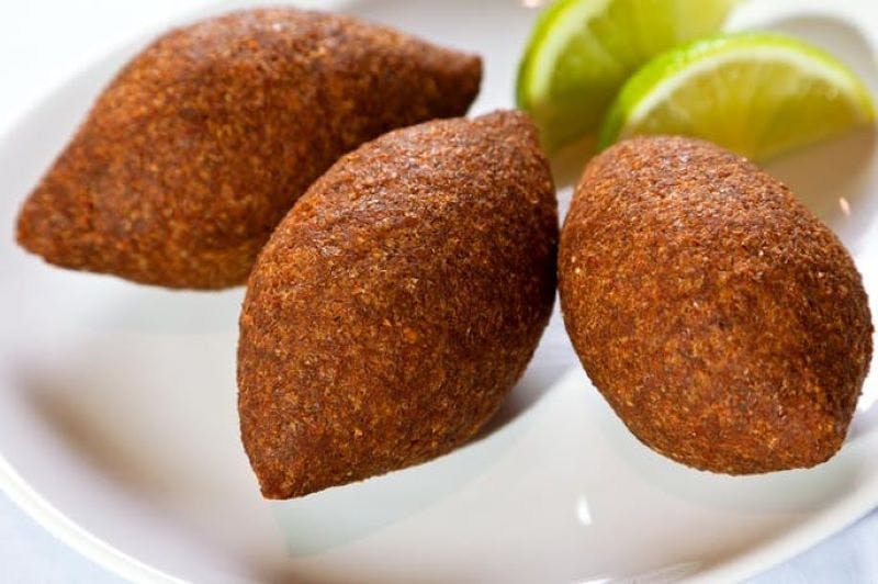 Order Kibbeh 12 PC - Appetizer food online from Gyro 101 store, Phoenix on bringmethat.com