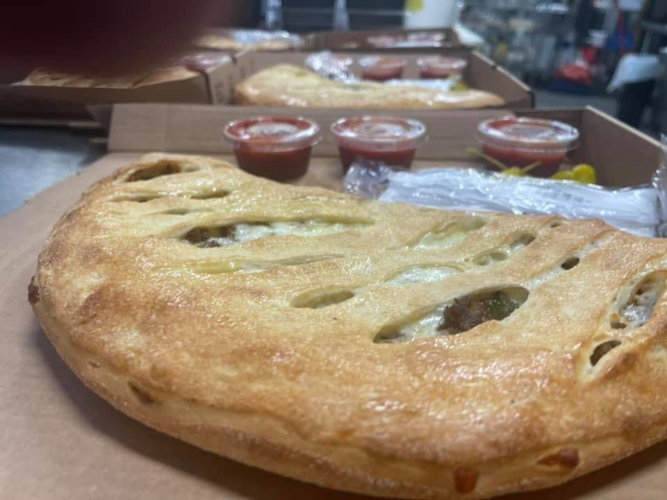 Order Chicken Calzone - 10" food online from Twins Pizza store, Dublin on bringmethat.com