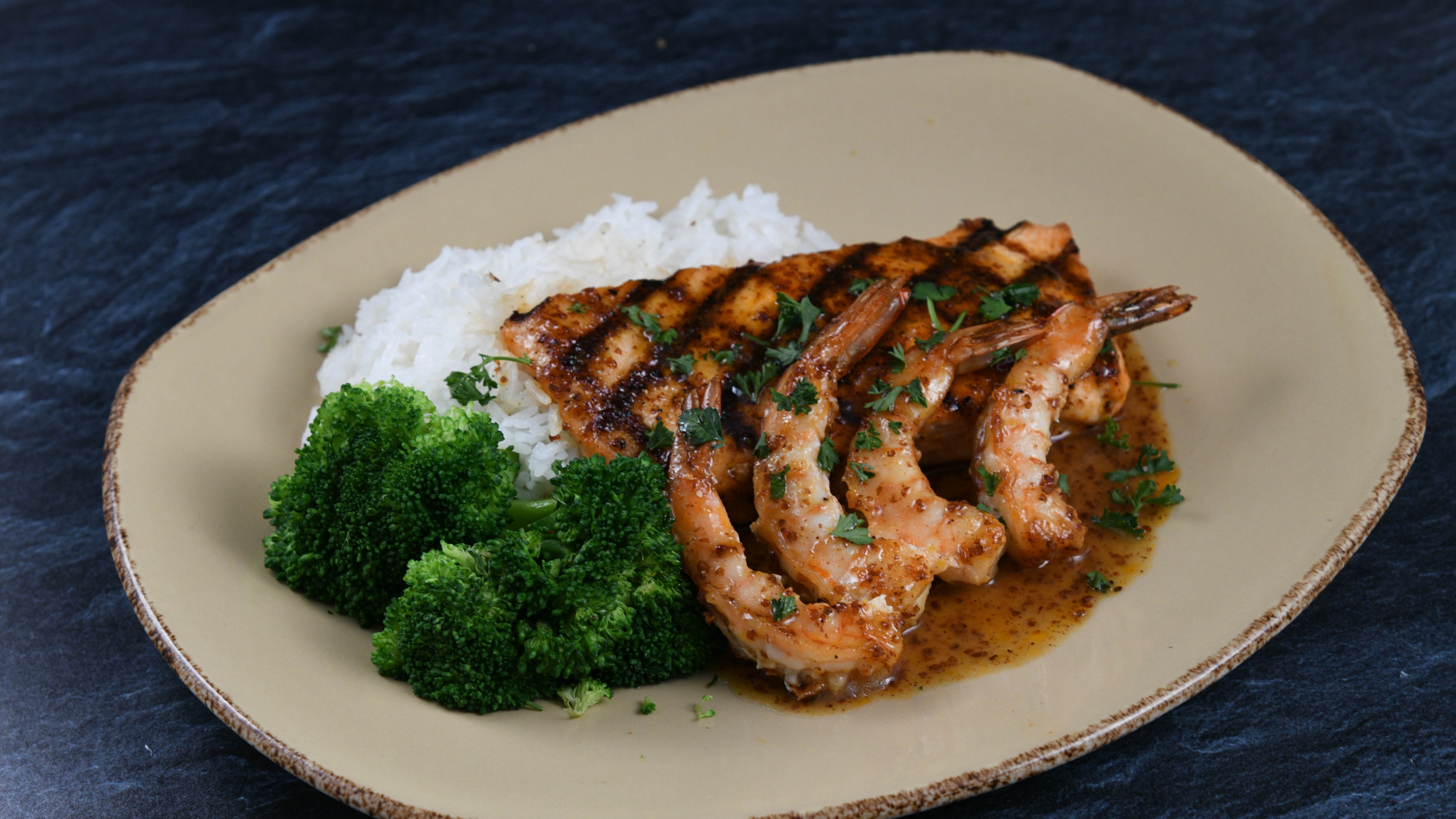 Order Aloha Salmon & Shrimp food online from Rainforest Cafe store, Tempe on bringmethat.com