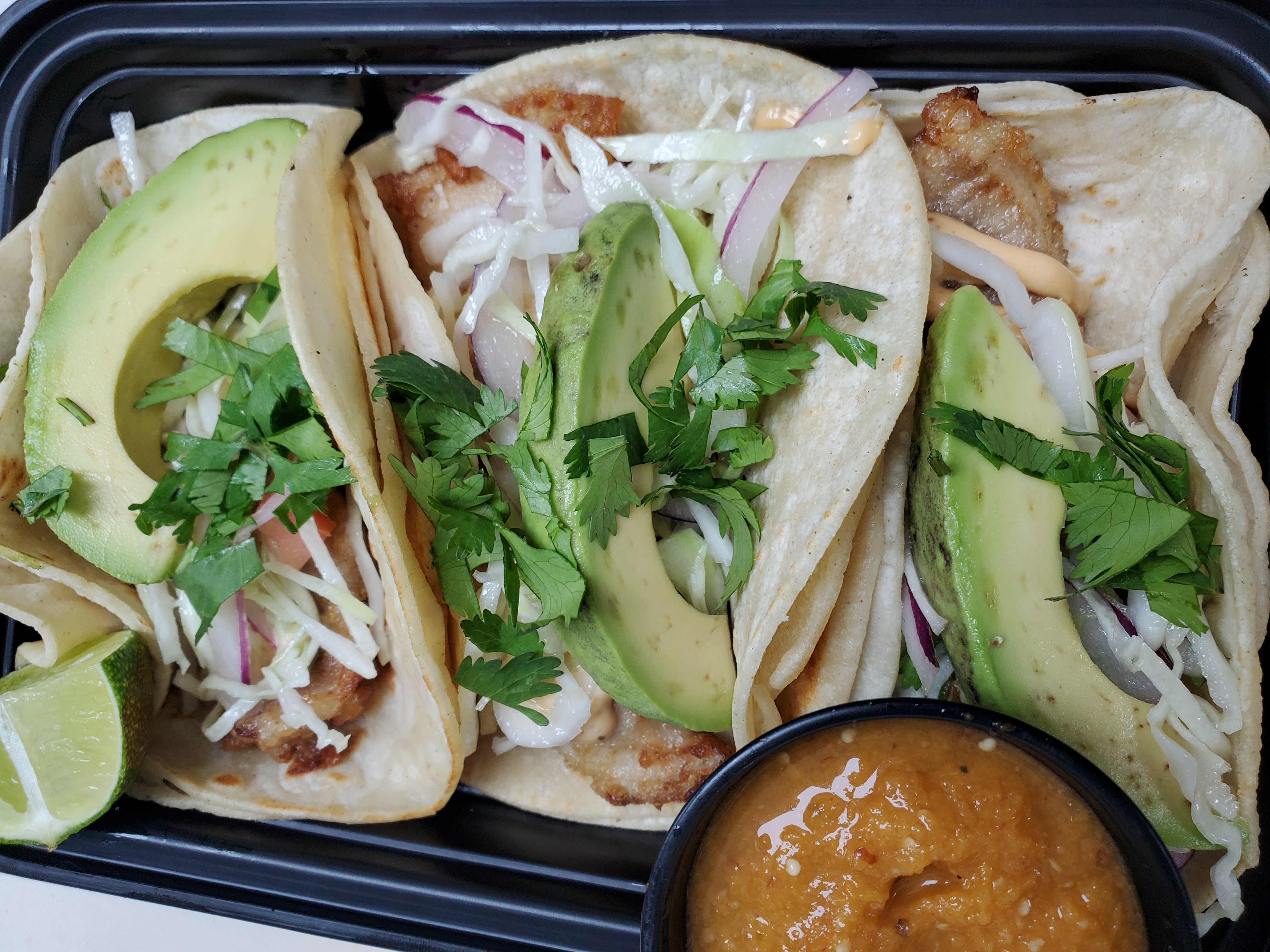 Order Baja Fish Tacos food online from Izlas Latin Cuisine store, Philadelphia on bringmethat.com
