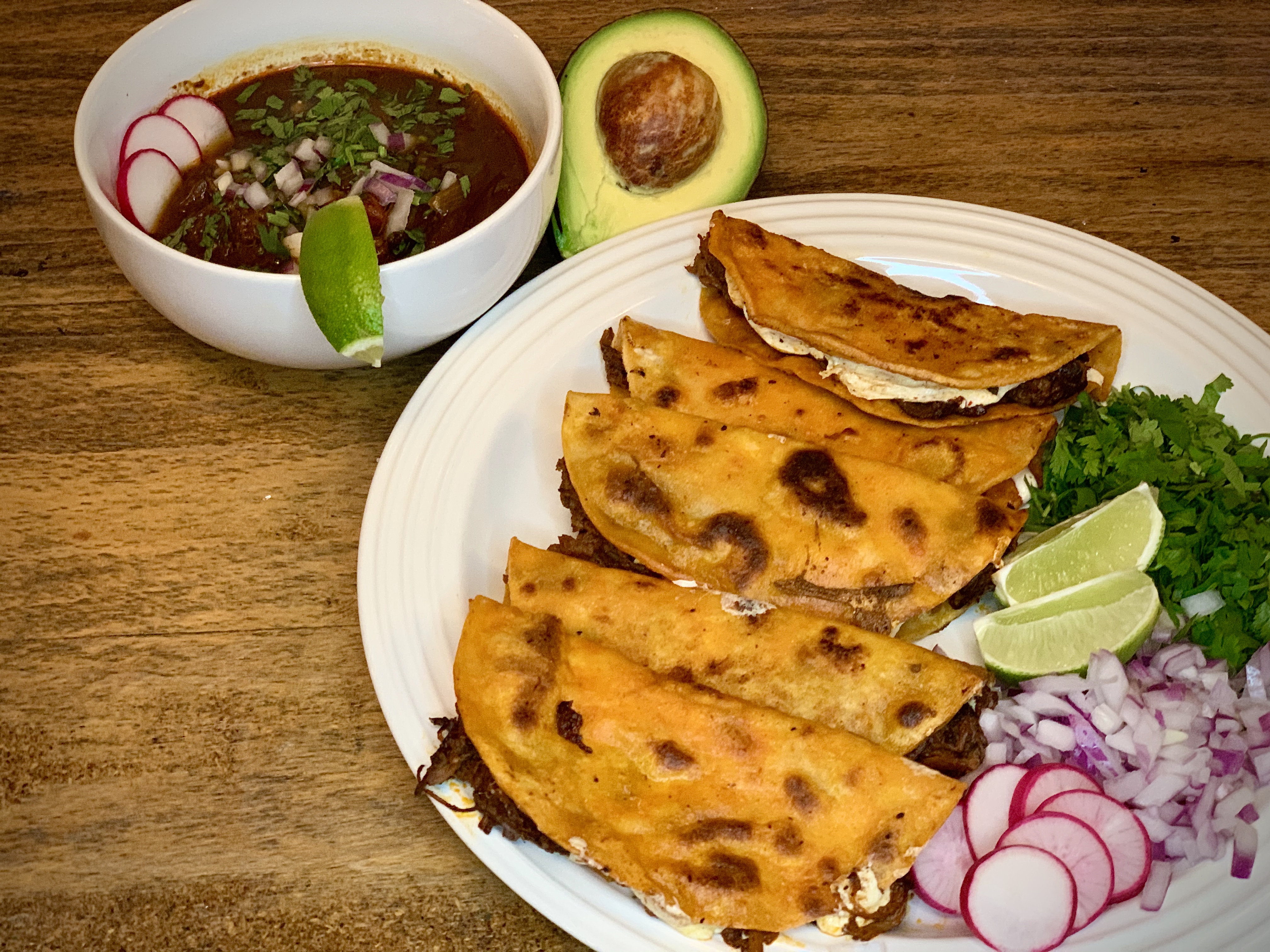 Order Birria QuesaTaco (3)and Consome (12oz) Combo food online from Ollin store, New York on bringmethat.com