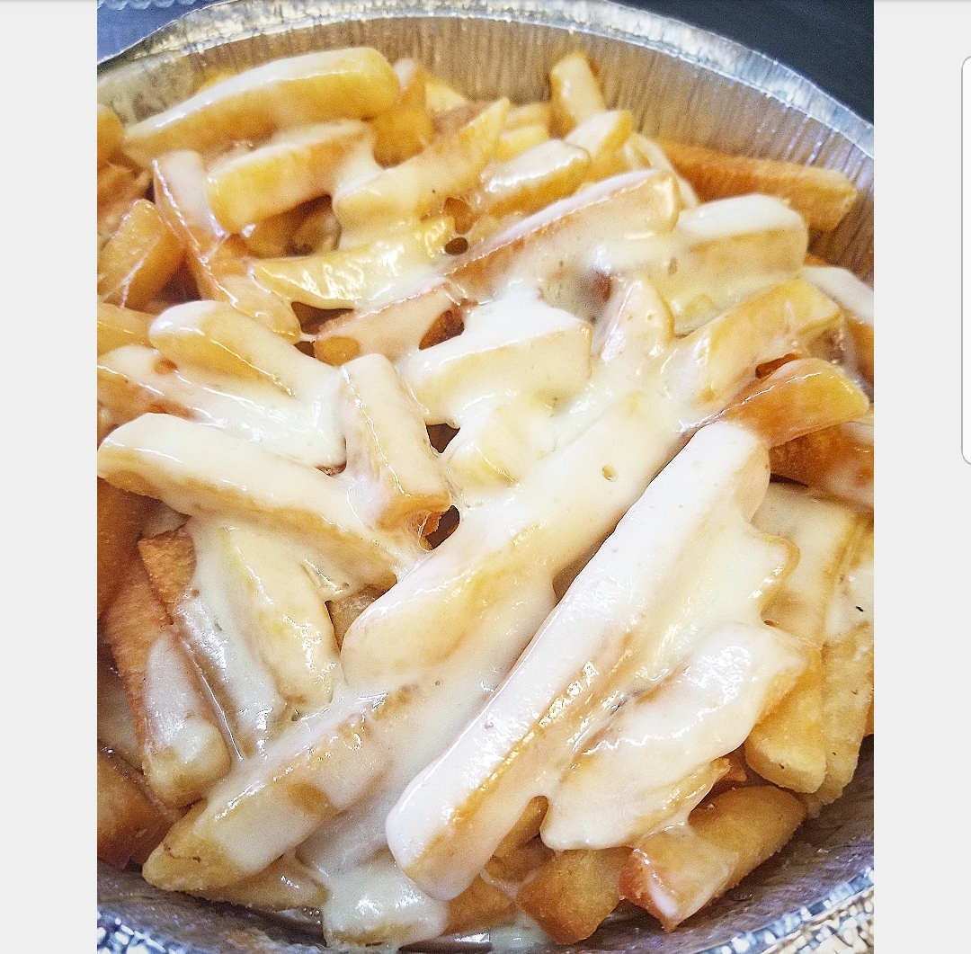 Order French Fries with Cheese food online from Pizza Mia store, Newburgh on bringmethat.com