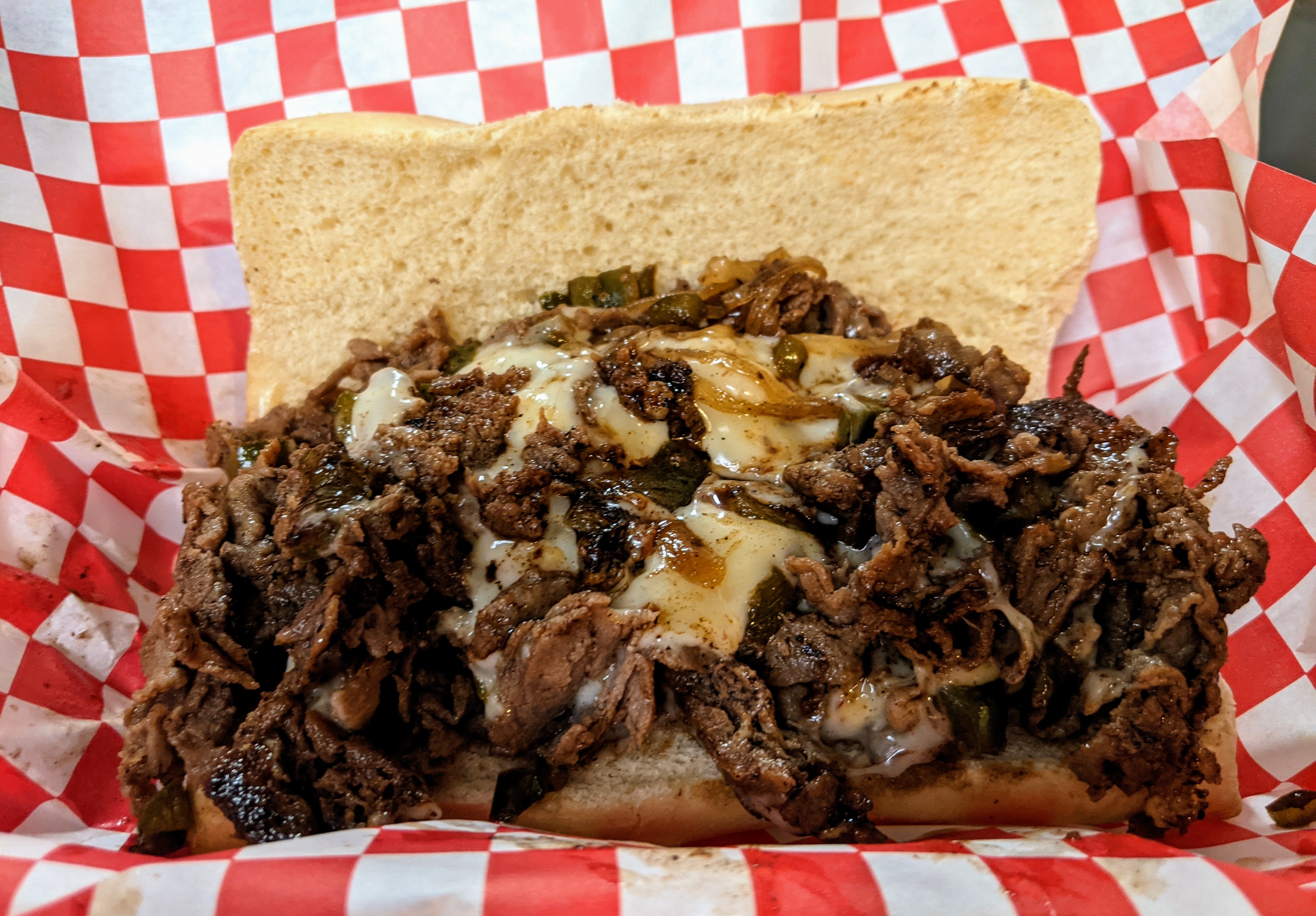 Order Philly Steak Sandwich food online from Hilltop Grill store, Creve Coeur on bringmethat.com