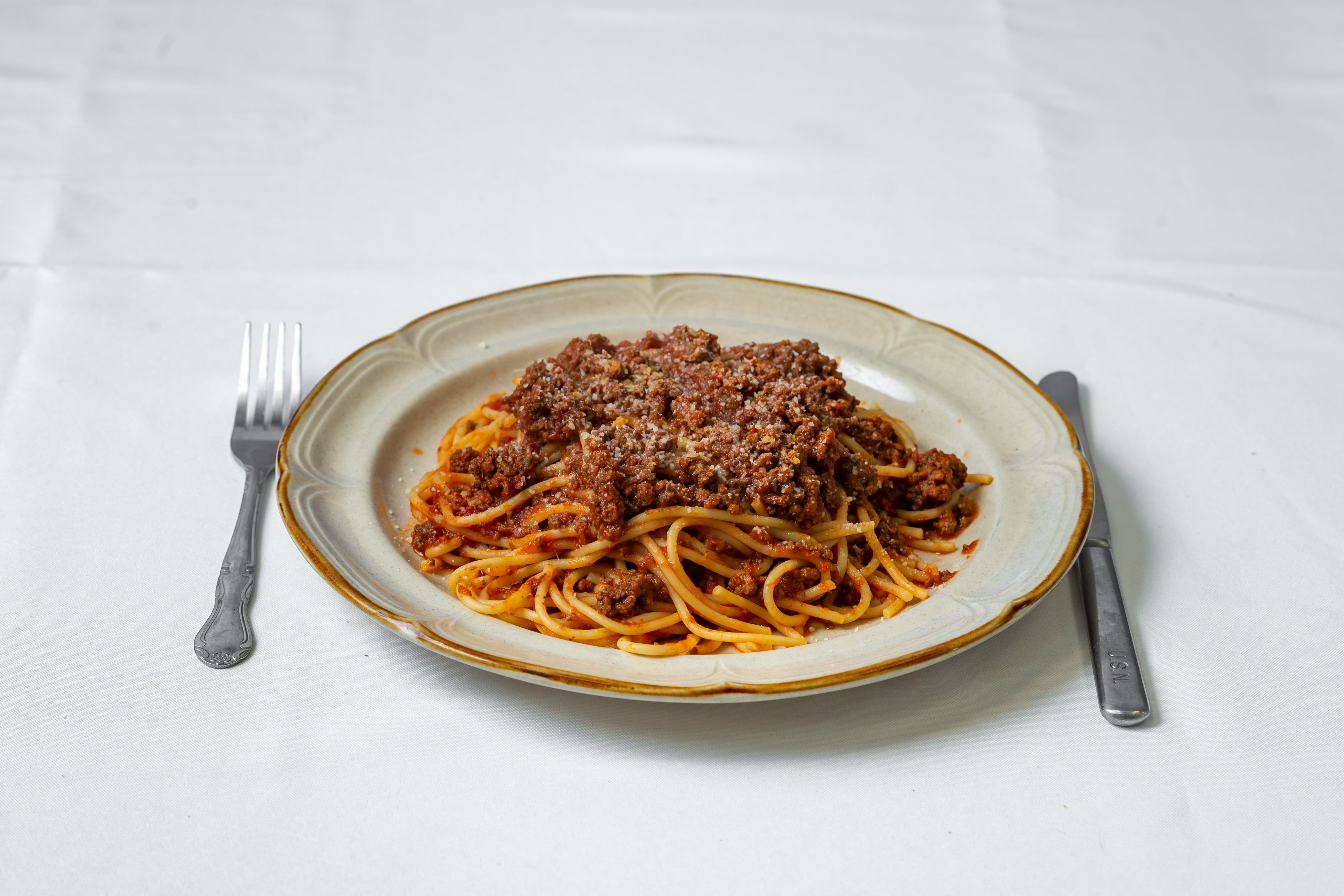 Order Pasta with Meat Sauce - Pasta food online from Doria Pizza Restaurant store, Summit on bringmethat.com