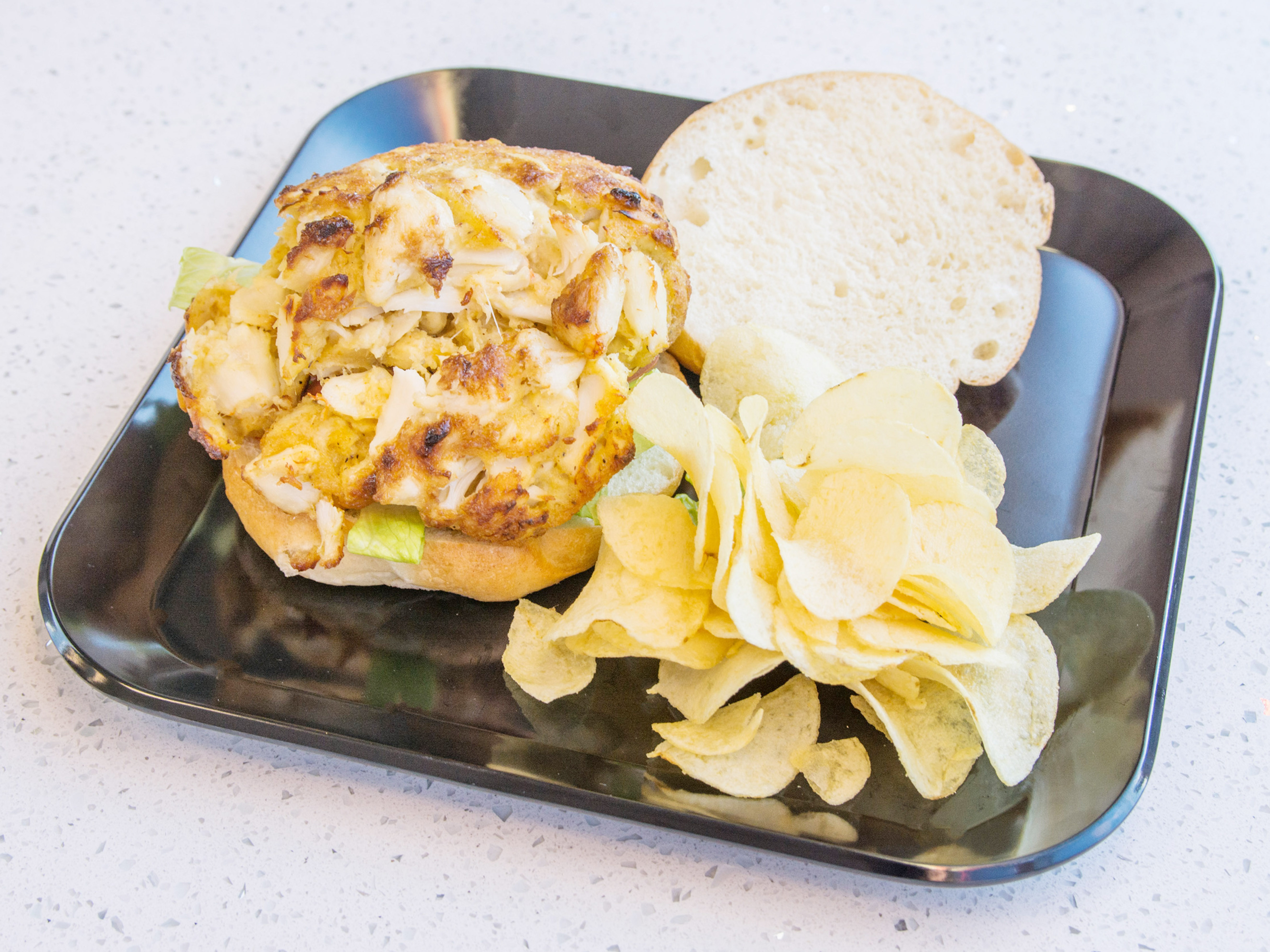 Order Jumbo Lump Broiled Crab Cake Sandwich food online from Chris Seafood store, Baltimore on bringmethat.com