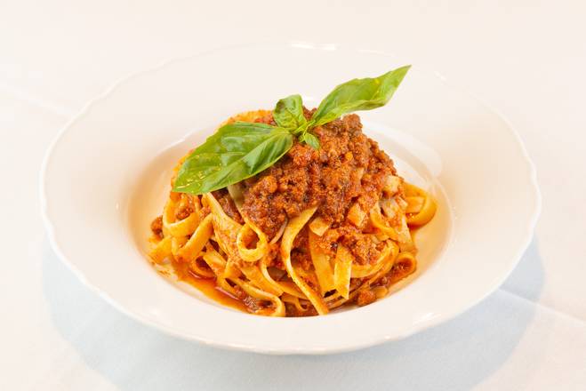 Order Fettuccine alla Bolognese food online from Carmine Italian Cuisine store, Cottonwood Heights on bringmethat.com