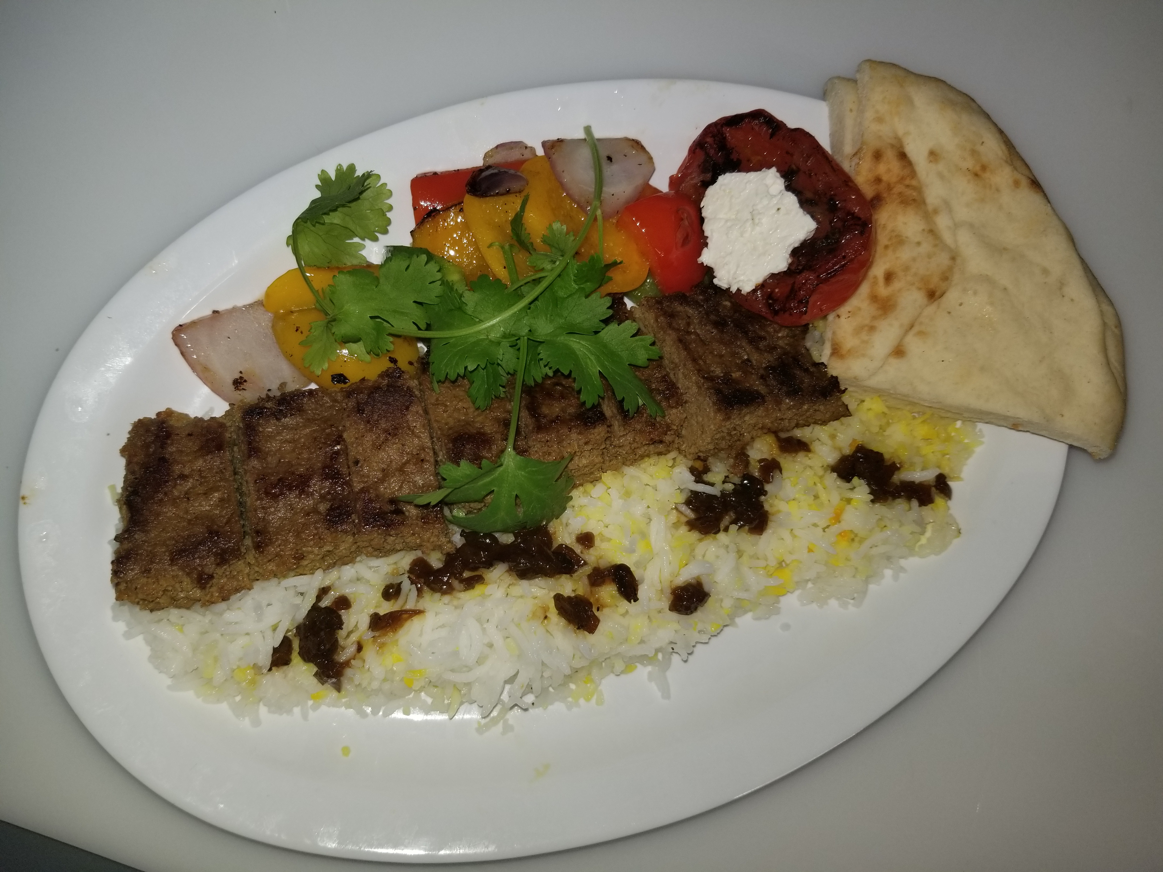 Order Ground Lamb & Beef Kabob on rice food online from Peachtree Neighborhood Grill store, Nashville on bringmethat.com