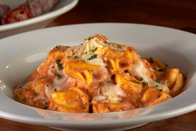 Order Baked Cheese Tortelloni- Box food online from Johnny Carino store, El Paso on bringmethat.com