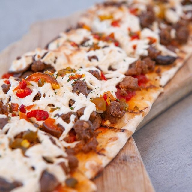 Order Vegan Mozzarella and Sausage Flatbread food online from The Social List store, Long Beach on bringmethat.com