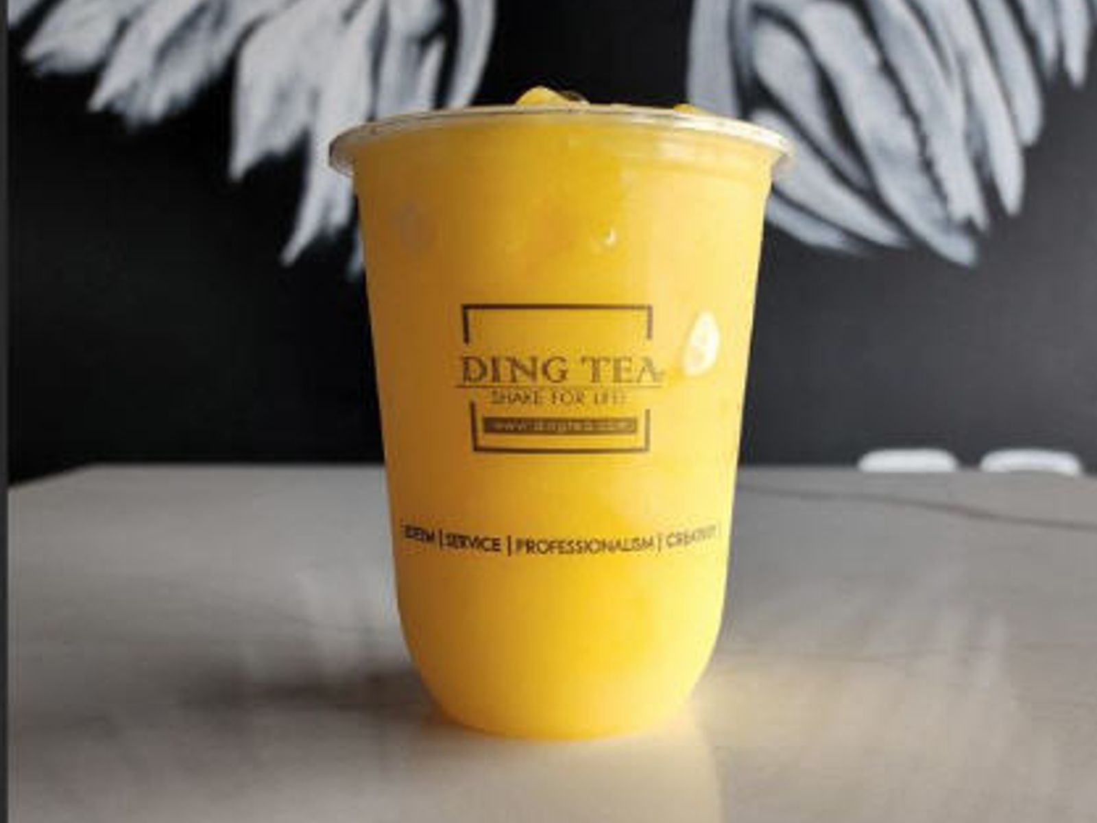 Order Mango Slush food online from Ding Tea Carson store, Carson on bringmethat.com