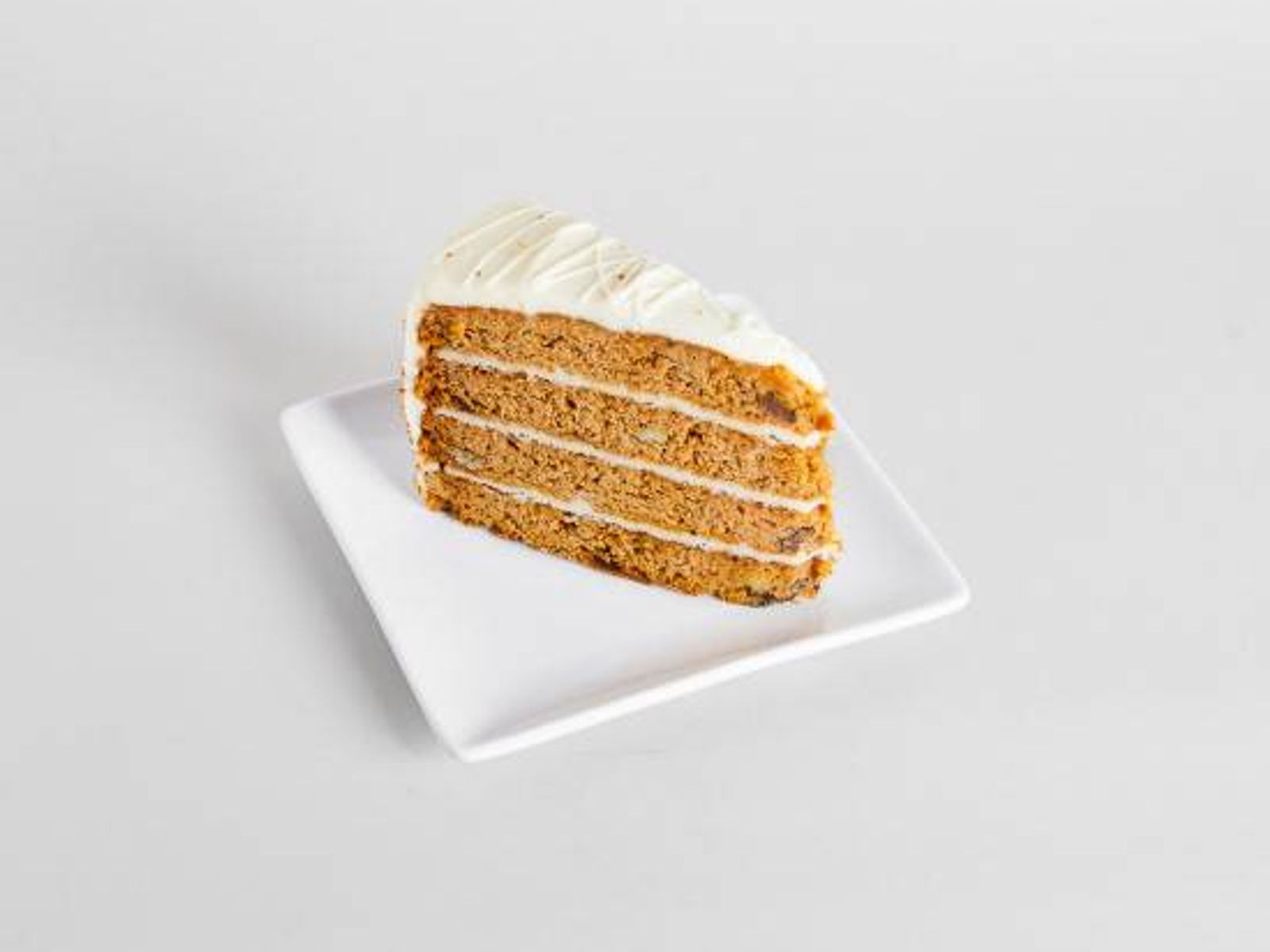 Order Classic Carrot Cake (Slice) food online from Sweetwaters Coffee & Tea store, Shelby Charter Township on bringmethat.com