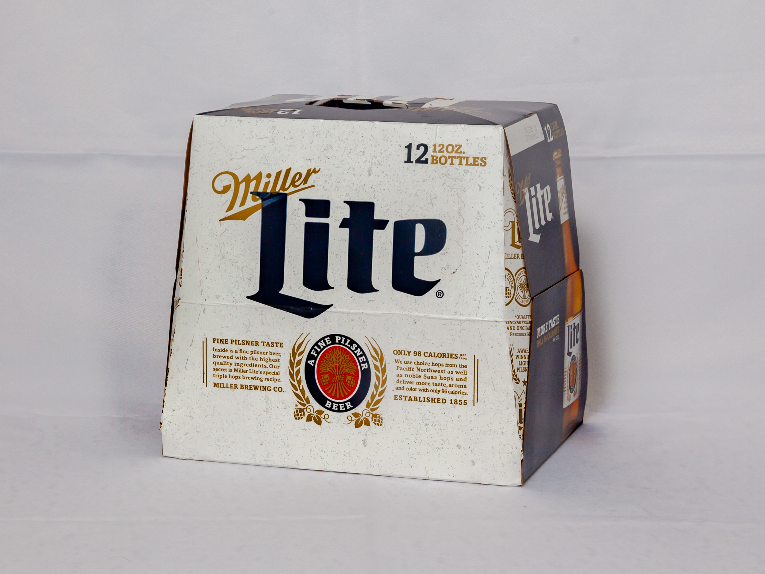 Order Miller Lite 12 Pack 12 OZ Bottles Beer food online from Country Club Hills Food And Liquor store, Country Club Hills on bringmethat.com