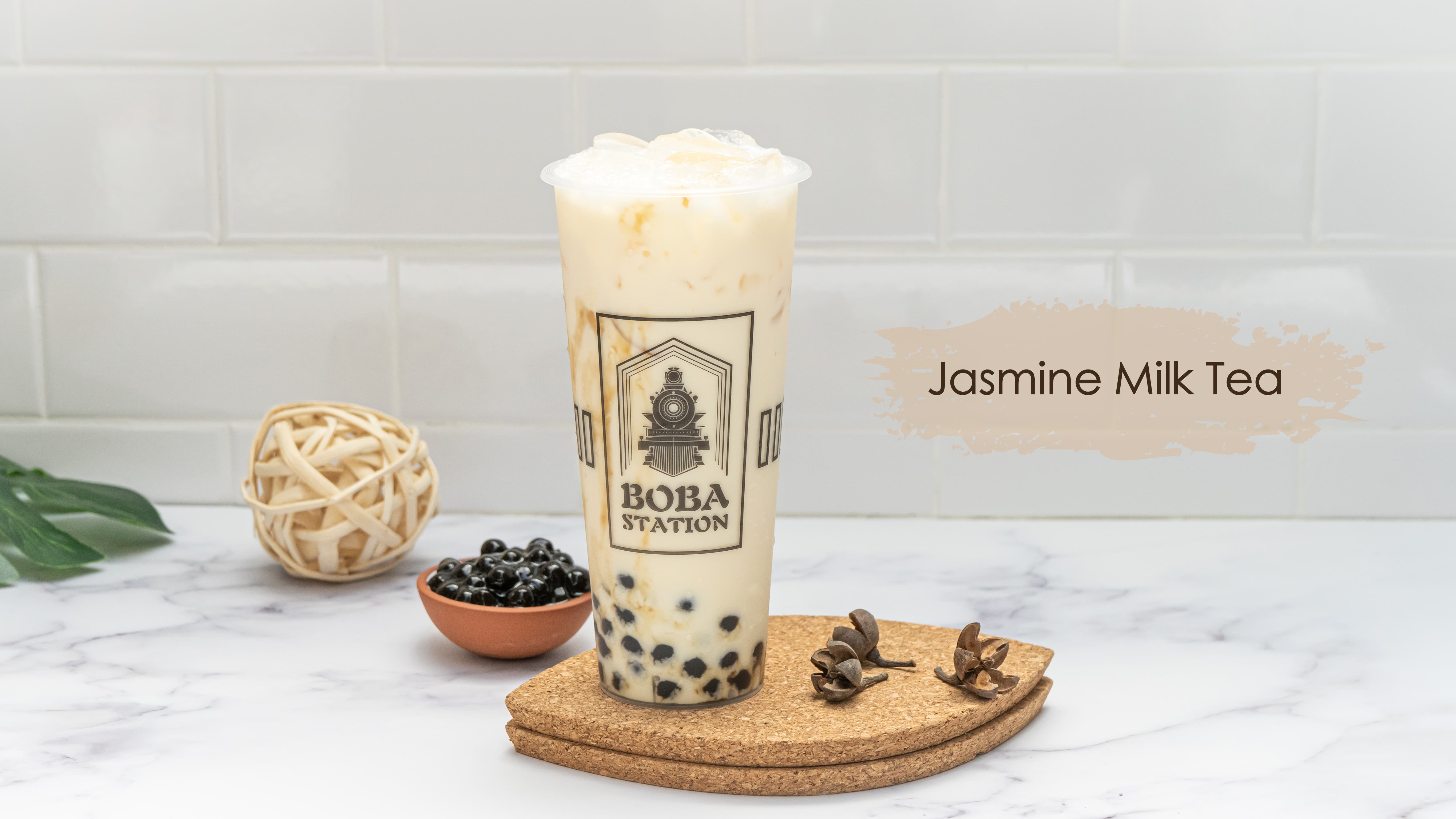 Order Jasmine Milk Tea food online from Boba Station store, Riverside on bringmethat.com