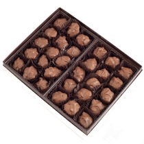Order 1 Lb. Pecan Tootles food online from Chocolate Chocolate Chocolate store, Kirkwood on bringmethat.com