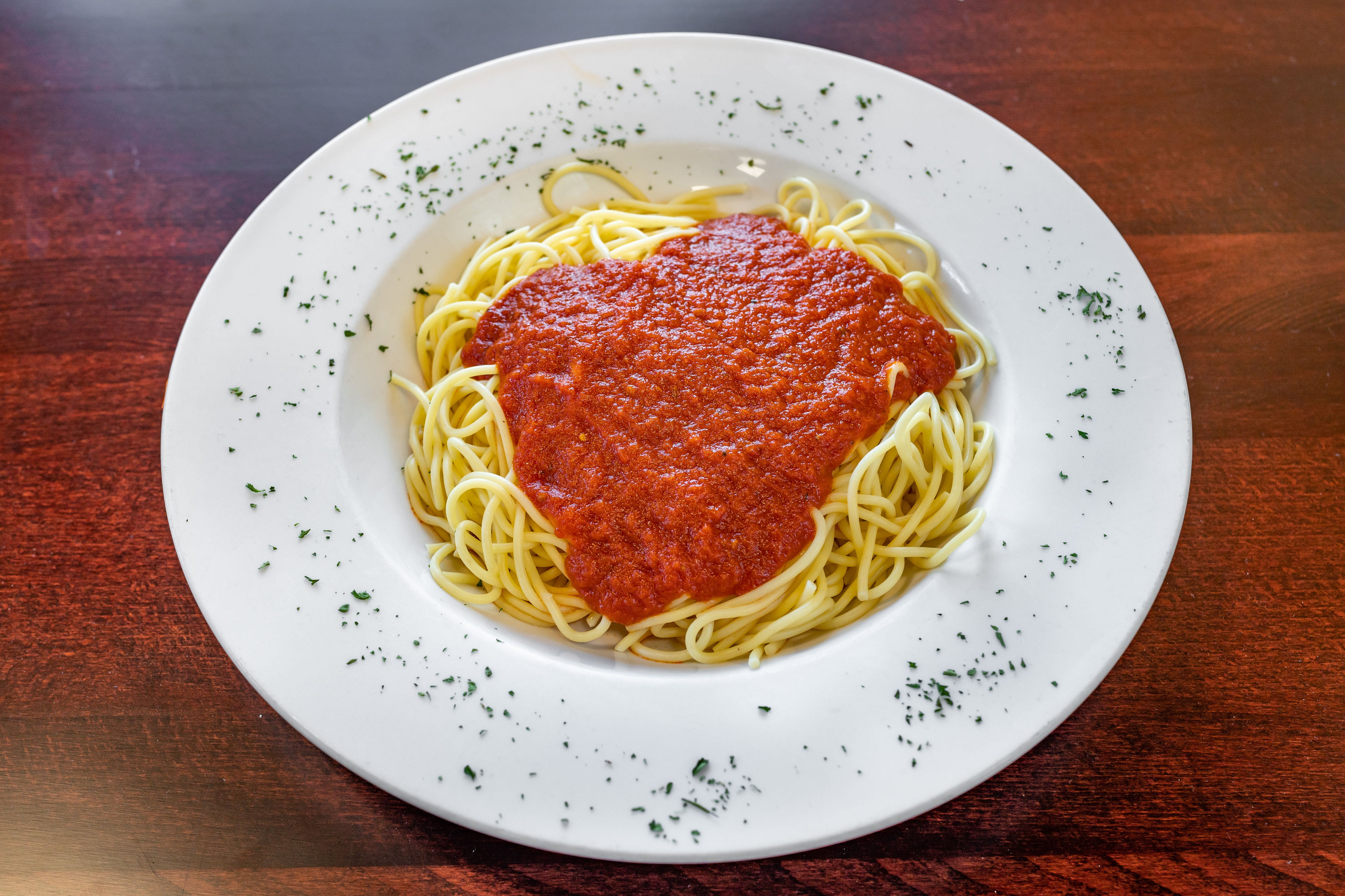 Order Kid's Spaghetti with Tomato Sauce - Children's Menu food online from Capriccios Italian Restaurant store, Henrico on bringmethat.com