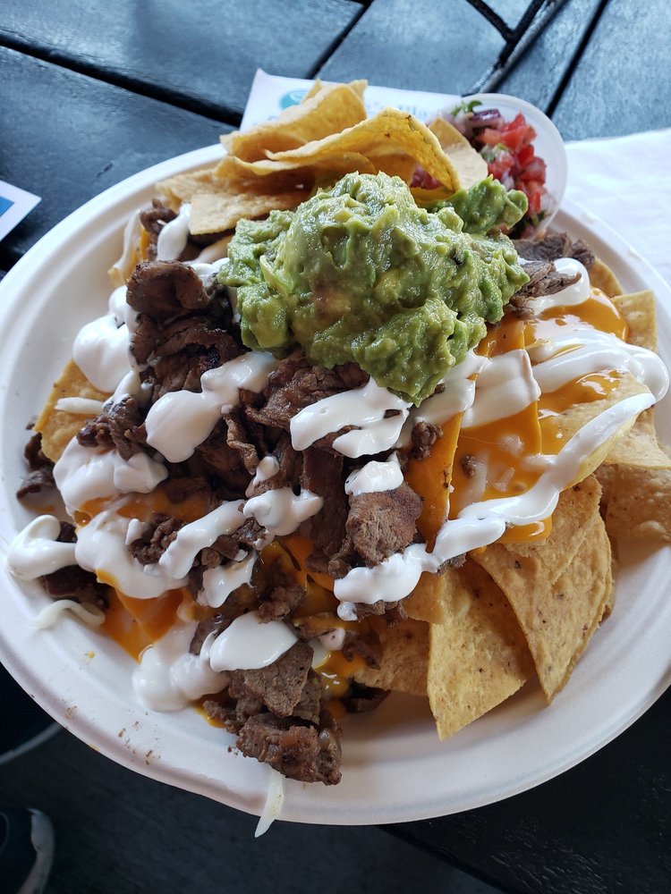 Order Steak Nachos food online from Zoe Place Tacos &amp; Seafood store, San Diego on bringmethat.com