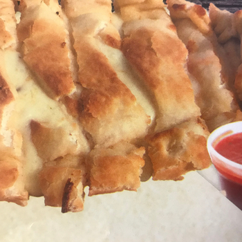 Order Cheesy Breadsticks food online from Uncle Lar Pizza store, Plano on bringmethat.com
