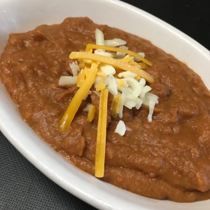 Order Side Refried Beans food online from Poco Mexican/American Restaurant, Bar & Comedy Cabaret store, Doylestown on bringmethat.com