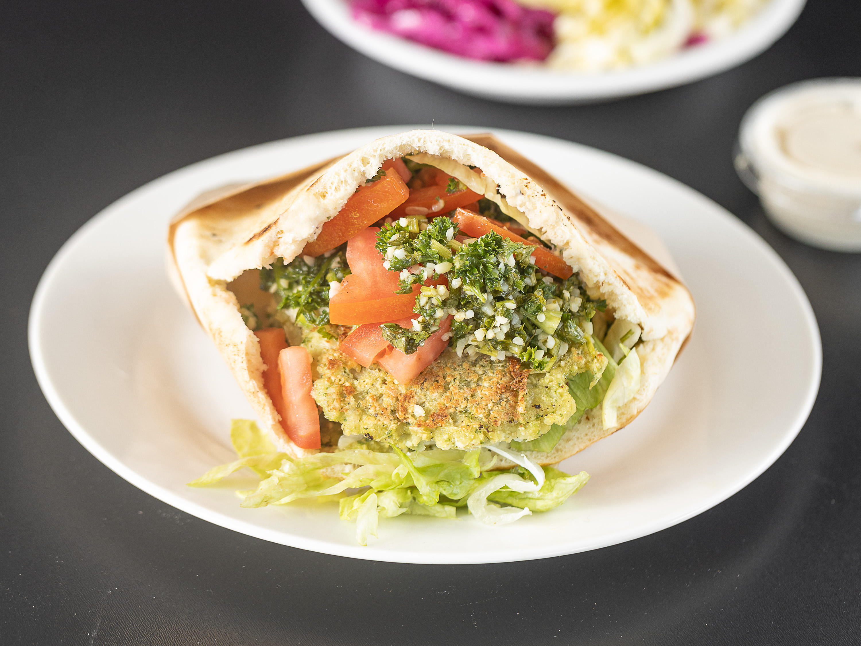 Order Classic Falafel PIta GRILLED  - NOT FRIED food online from Falafel Palace store, Los Angeles on bringmethat.com