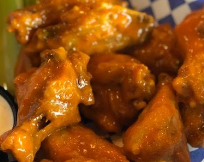 Order Traditional Bone-In Wings food online from TnT Wings store, Omaha on bringmethat.com