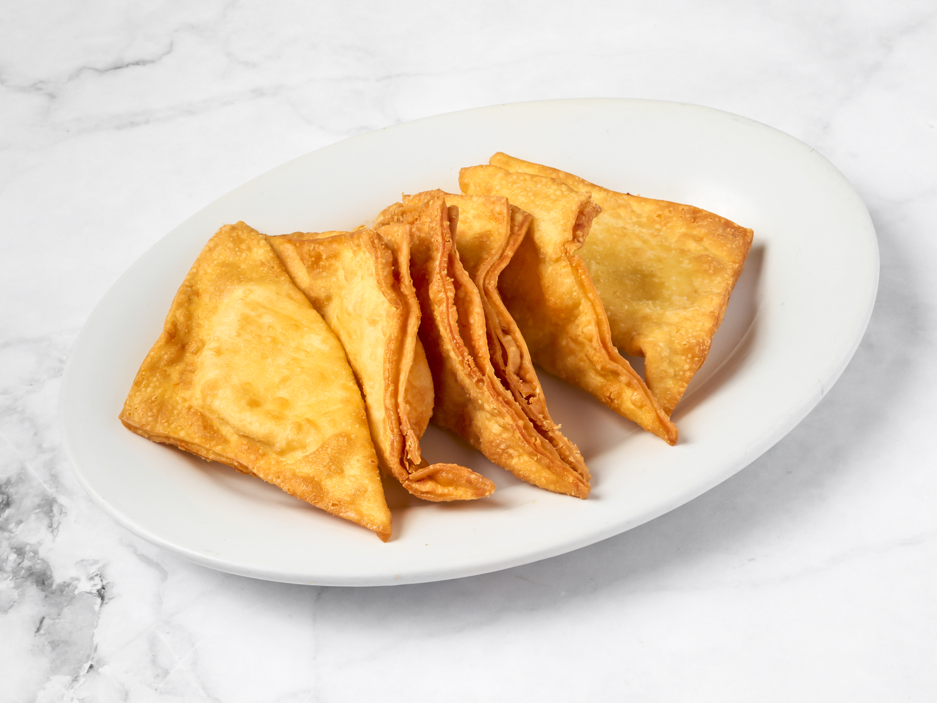 Order 6 Crabmeat Rangoons food online from Tang's Chinese Restaurant store, Grayslake on bringmethat.com