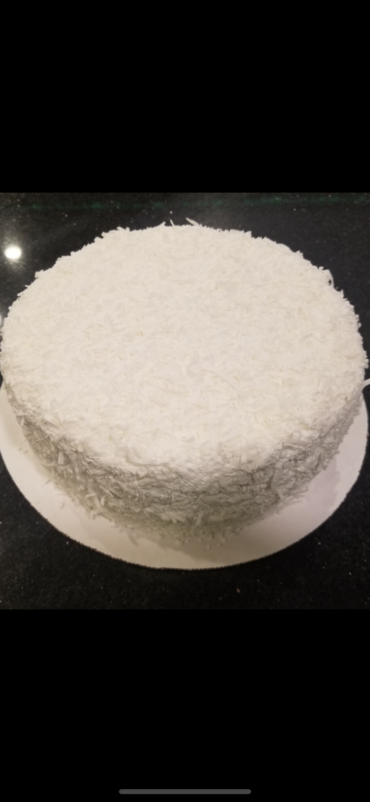 Order Coconut Layer Cake food online from El Greco Pizza & Pasta store, Elmhurst on bringmethat.com