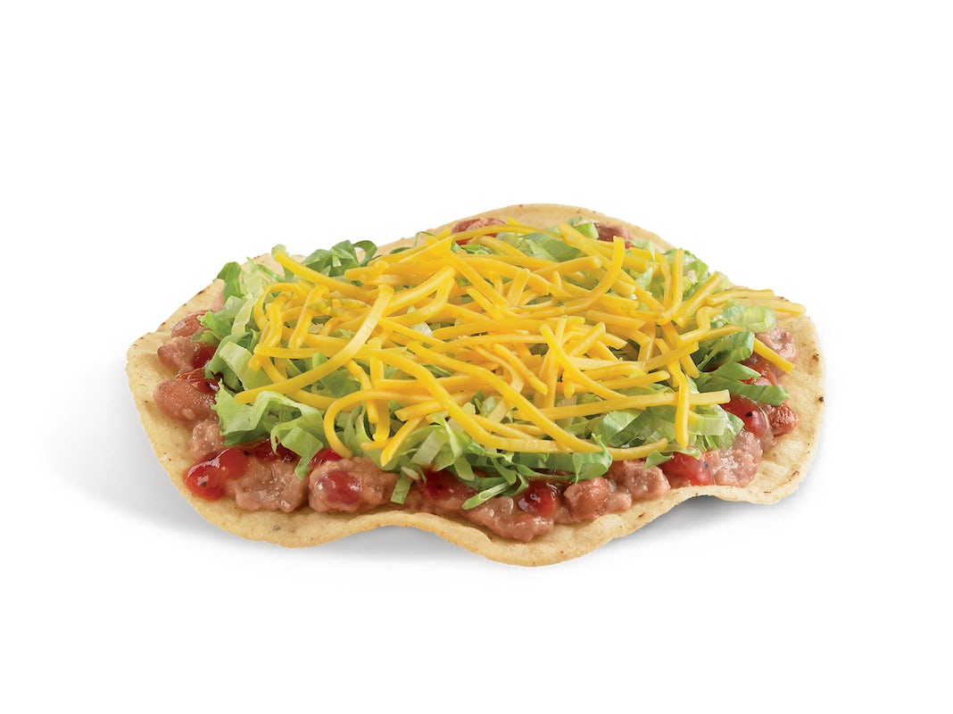 Order Crunchtada® Tostada food online from Del Taco store, Chino on bringmethat.com
